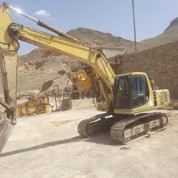 بیل مکانیکی و لودر  و کامیون