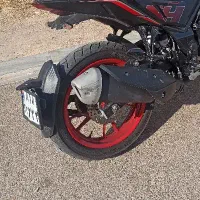 یک عدد پلاک موتور 33233ایران۸۱۸گم شده