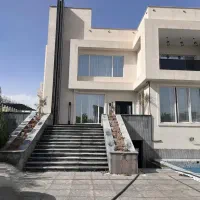 باغ ویلا زمین 1000متر تهاتر کردان طاووسیه