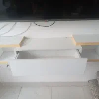 شلف و ساعت دیواری