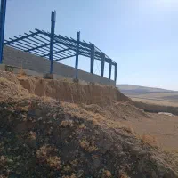 زمین-کارخانه-ای-با-سوله-نیمه-کاره