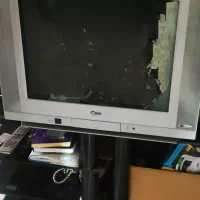 تلویزیون و میز تلویزیون فقط 1500