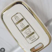 گمشده کلید ماشین پژو به همراه ریموت سفید رنگ
