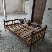 تخت خواب چوبی و فلزی