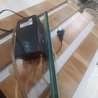 شیشه اکواریوم و پمپ هوا