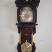 ساعت دیواری آونگ دار