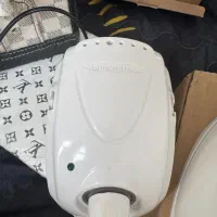 دستگاه کاشت ناخن