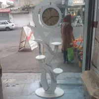 ساعت ایستاده ماه سه ویترینه