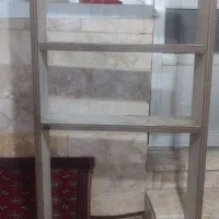 شلف  جای کتاب یا اشکاف.