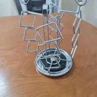 قاب‌ فلزی چرخان نگهدارنده عکس