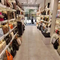 نیروی ماهر خانم ( تخته کار و وردست ماهر)کیف چرمی
