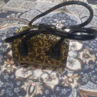 کیف مشکی با طلای گلدار کوچیک