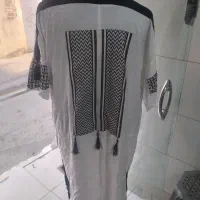 پالتو وبارانی|لباس|قدس, شهرقدس|دیوار