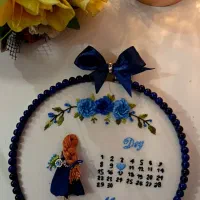 دیوارکوب ، لباس گلدوزی