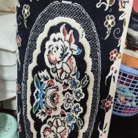 دو عدد پشتی و یک اتو استفاده نشده