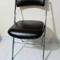 صندلی تاشو استیل روکش چرم