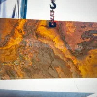 تهاتر سنگ ساختمانی با ملک