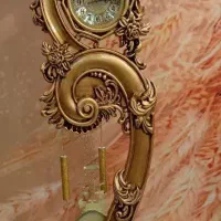 ساعت  ایستاده ی ورق طلا