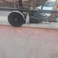 سنگ فرز متابو در حد به همراه دو بسته صفحه استیل بر