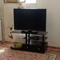 تلویزیون JVC و زیر تلویزیون