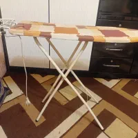 میز اتو ایستاده همراه با پیریزودوشاخه برق