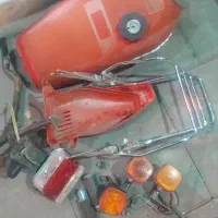 لوازم موتور کاربرات تکبندهندل آینه وسرسیلندر