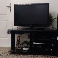 تلویزیون هوشمند ال ای دی 32 ال جی با میز