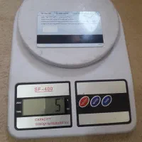 ترازو. باطری قلمی تا ۸کیلو را می کشه