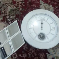 ساعت و اینه.