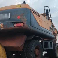 بیل مکانیکی ۲۱۰ هیوندایی چرخ لاستیکی