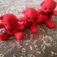 عروسک و تعدادی وسایل