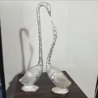 قو برنزی رنگ نقره ای خورده