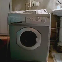 یک عدد لباسشویی 7 کیلویی و یک یخچال فریزر پارس