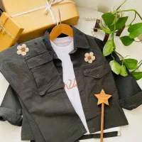 لباس بچه گونه|کفش و لباس بچه|قم, قلعه کامکار|دیوار