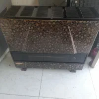بخاری گازی قاینار خزر و یک یخچال  سالم