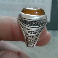 ۸ عدد انگشتر نقره و یک عدد سکه نقره و یک‌ پیپ