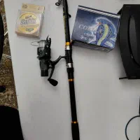 چوب و چرخ ماهیگیری بهمراه کیف برزنتی