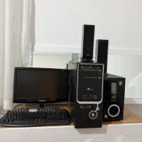 کامپیوتر همراه با کیبورد و باند