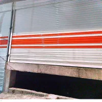 درب کرکره برقی و شیشه سکوریت