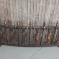 جلوی شومینه ای مسی
