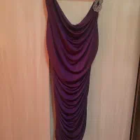 تعدادی لباس( پیراهن و مانتو وشومیز)