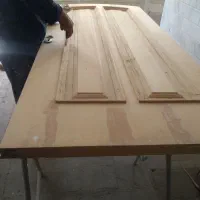 رنگ کاری وپلیستر درب های چوبی
