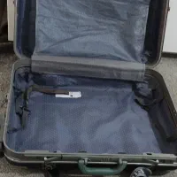 چمدان مسافرتی|کیف، کفش، کمربند|نیشابور, گنبد سبز|دیوار