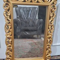 فروش یک آیینه سلطنتی به رنگ طلایی