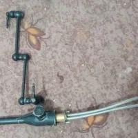 شیر آلات برنجی سالم مارک بهمن شیراب و قابلمه پر کن