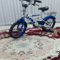 دوچرخه و طبل و فوتبال دستی