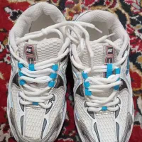 کتانی نو|کیف، کفش، کمربند|قم, چهل درخت|دیوار