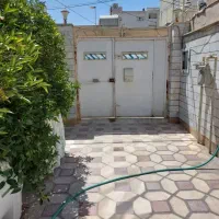 ویلایی-دوطبقه-درب-از-حیاط