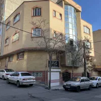 اپارتمان ۳ طبقه مسکونی همراه دو مغازه در ولیعصر