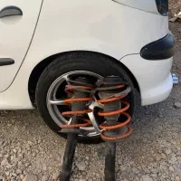 کمک فنر و فنر و توپی سر کمک پژو ۲۰۶،۴۰۵پارس،سمند